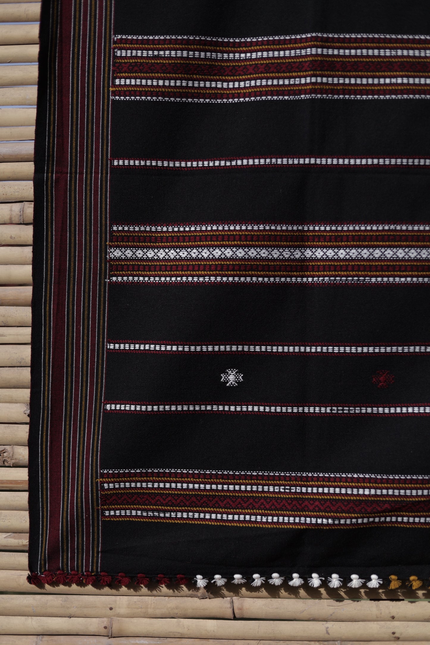 Traditional onyx black wool shawl showcasing authentic weaving artistry and timeless sophistication