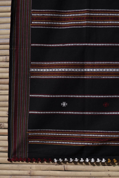 Traditional onyx black wool shawl showcasing authentic weaving artistry and timeless sophistication