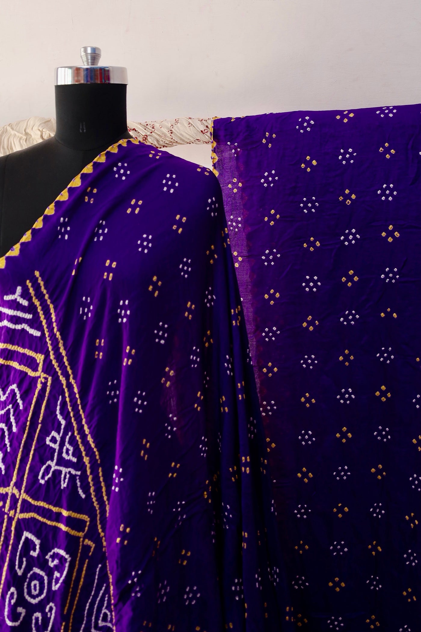 Handcrafted orchid Gajji silk saree showcasing authentic Bandhani artistry with rich zari detailing
