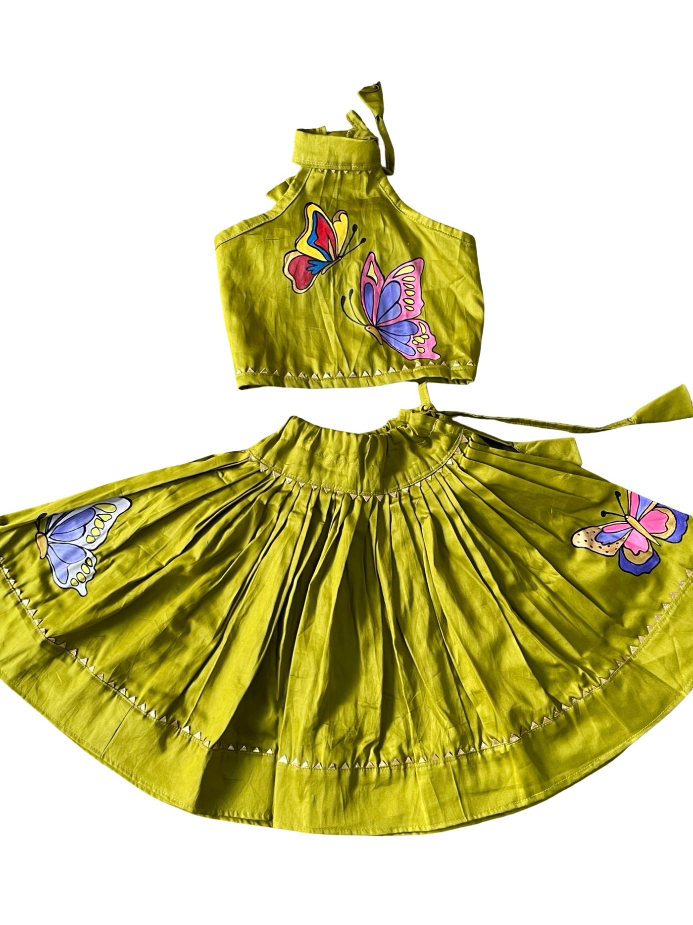 Parrot green handpainted cotton lehenga choli set for kids featuring handcrafted artwork and traditional elegance