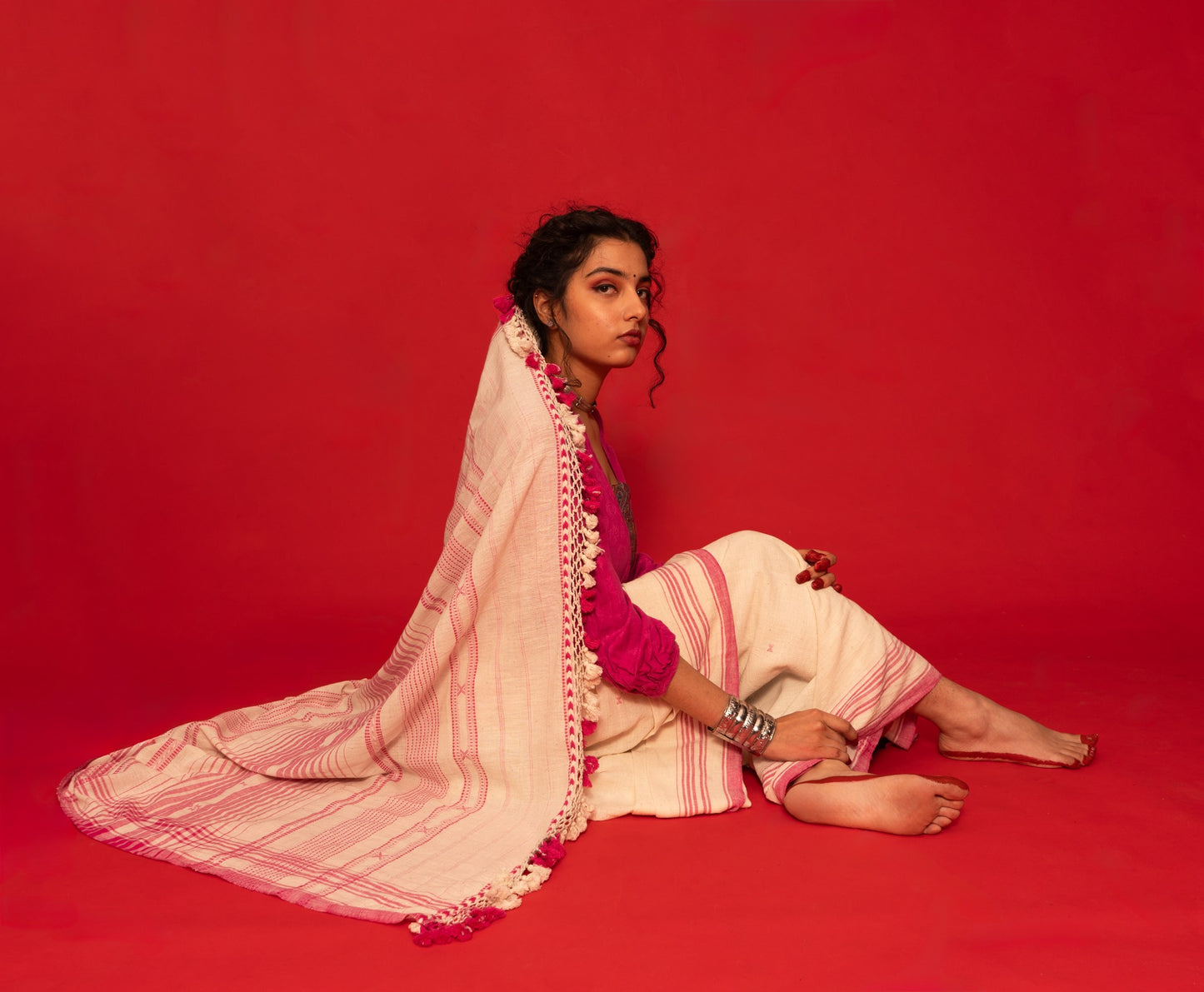 Elegant petal Bhujodi saree woven in sustainable Kala Cotton with intricate artisan detailing