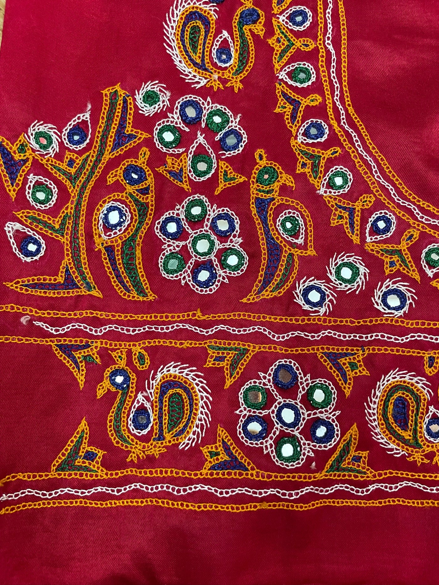 Traditional pink blouse piece featuring authentic Ahir embroidery craftsmanship