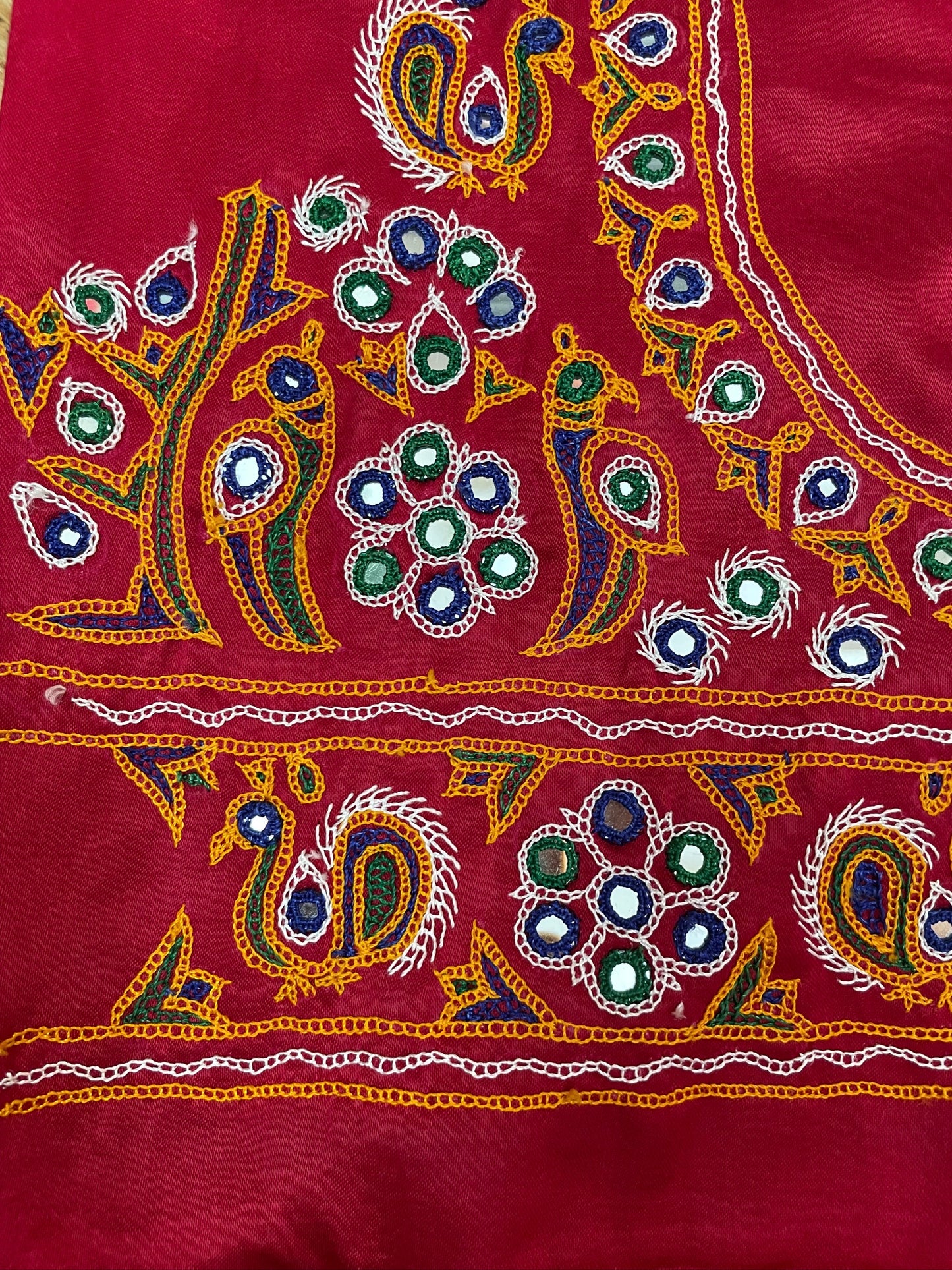Traditional pink blouse piece featuring authentic Ahir embroidery craftsmanship