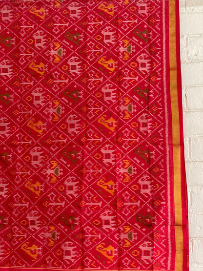 Handcrafted red Patola dupatta showcasing authentic Single Ikkat weaving artistry