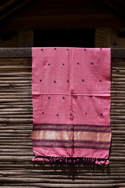 Classic handwoven woolen stole in rose blush designed for warmth, comfort, and sophisticated styling