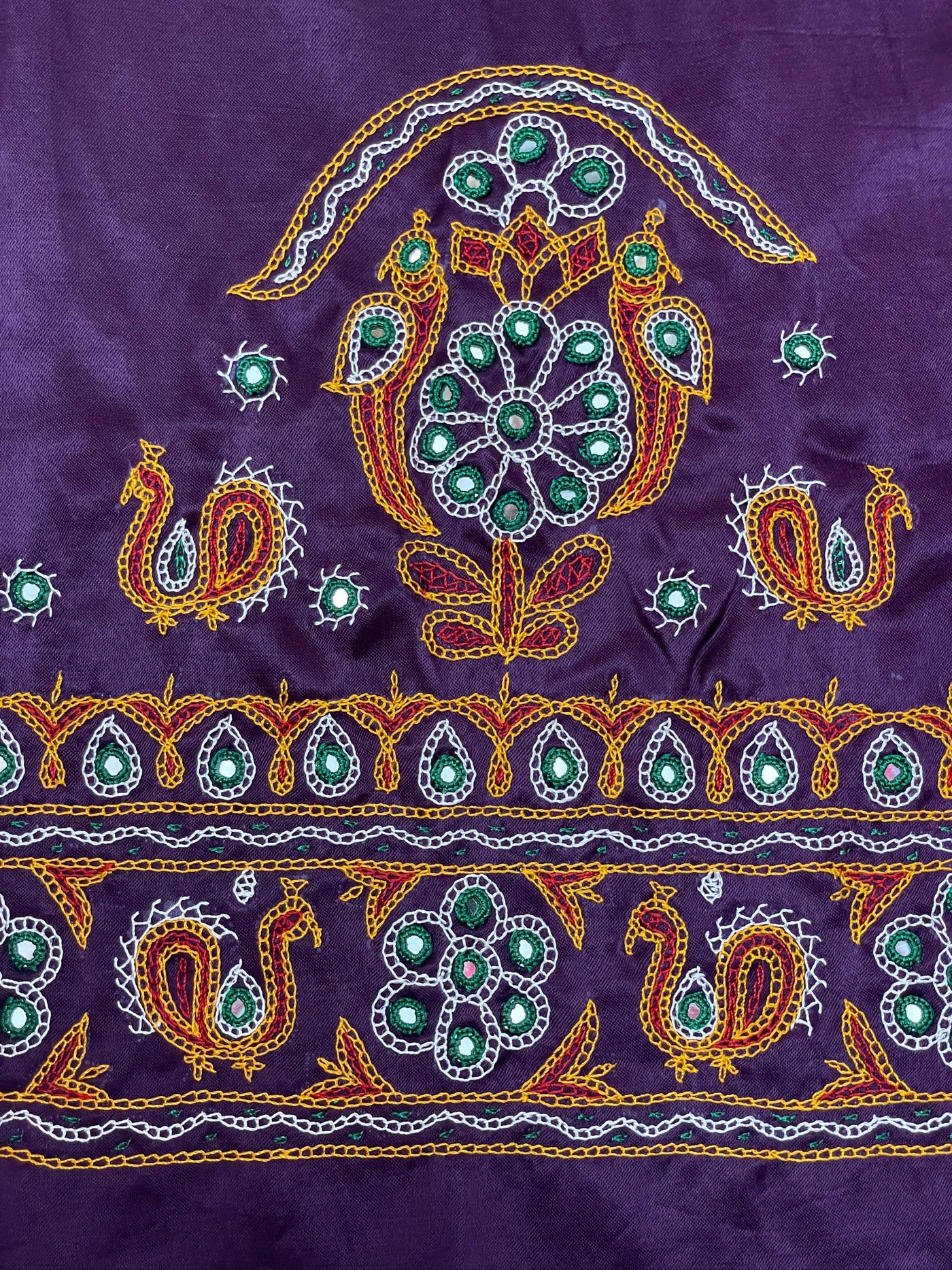 Elegant royal purple blouse piece adorned with beautiful Ahir embroidery motifs