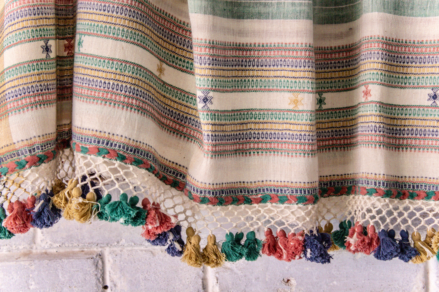 Elegant sand Bhujodi saree woven in sustainable Kala Cotton with intricate artisan detailing