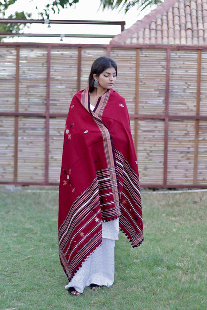 Traditional scarlet red wool shawl showcasing authentic weaving artistry and timeless appeal