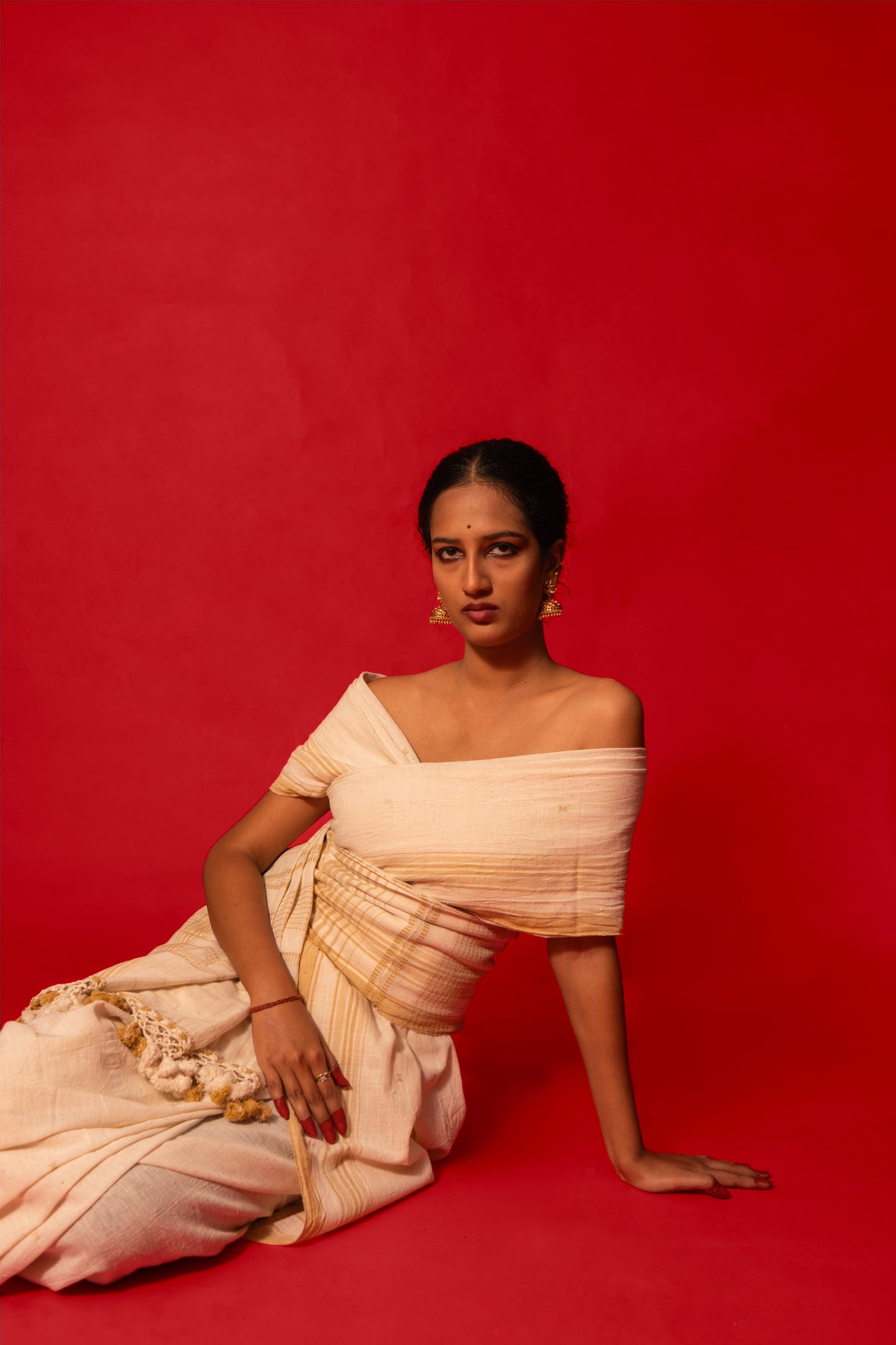 Elegant shell Bhujodi saree woven in sustainable Kala Cotton with intricate artisan detailing
