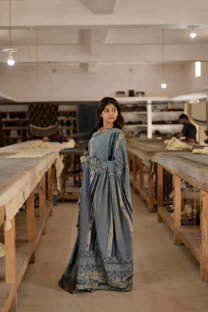 Elegant slate blue stripe Ajrakh saree crafted in lightweight mul cotton with heritage-inspired designs