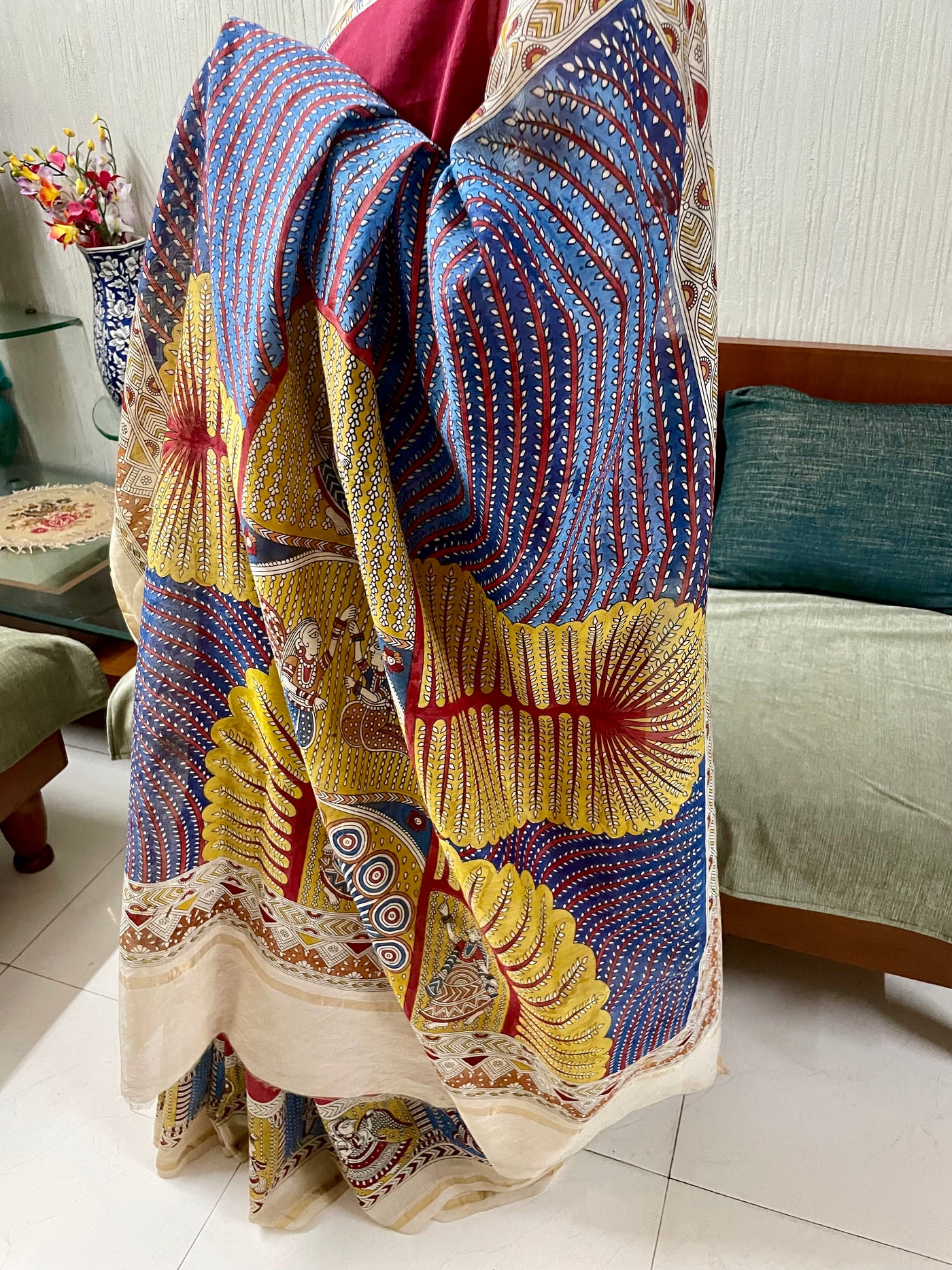 Eegant sunburst saree showcasing detailed Mata Ni Pachedi artwork created by skilled artisans