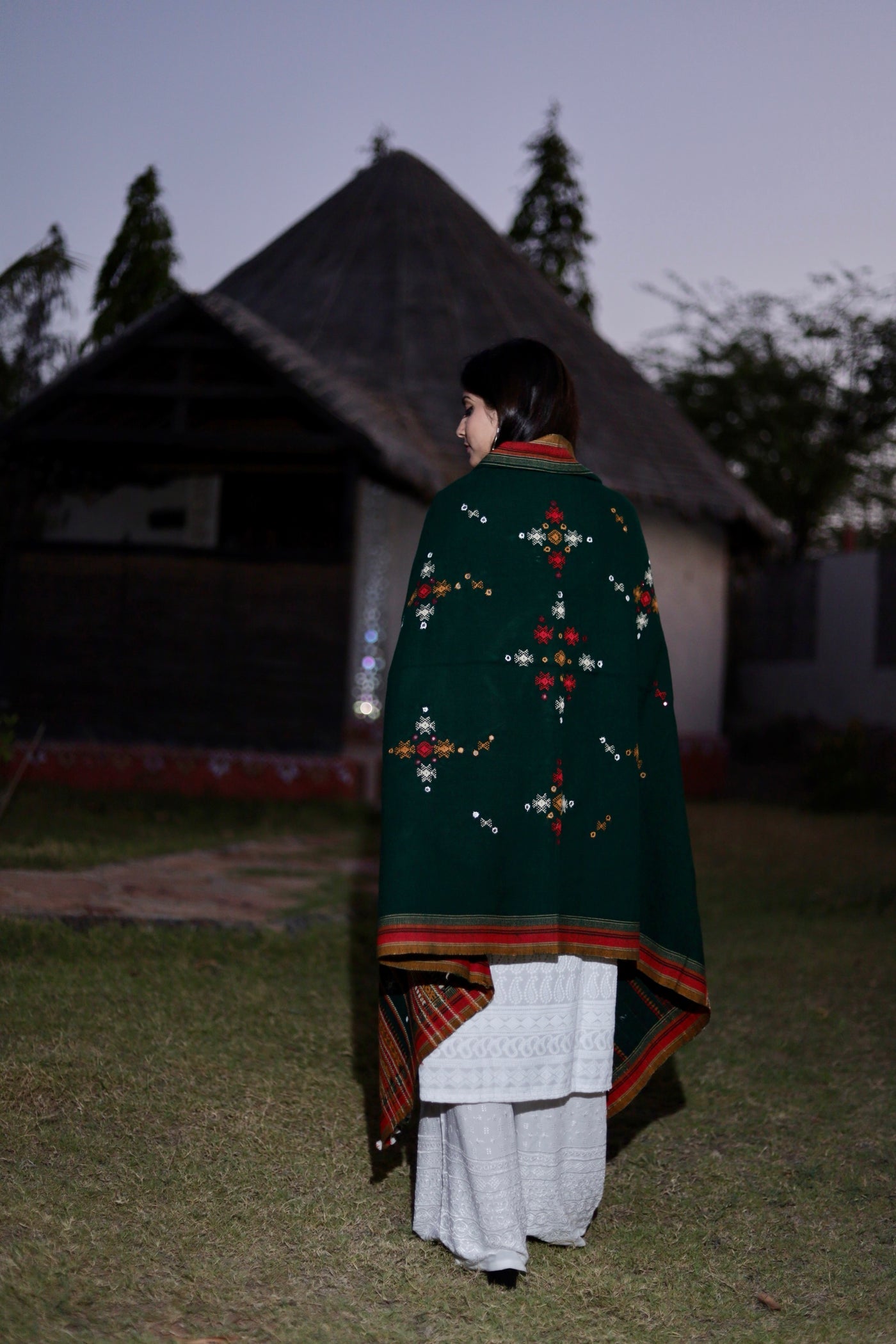 Traditional teal wool shawl showcasing authentic weaving artistry and timeless appeal