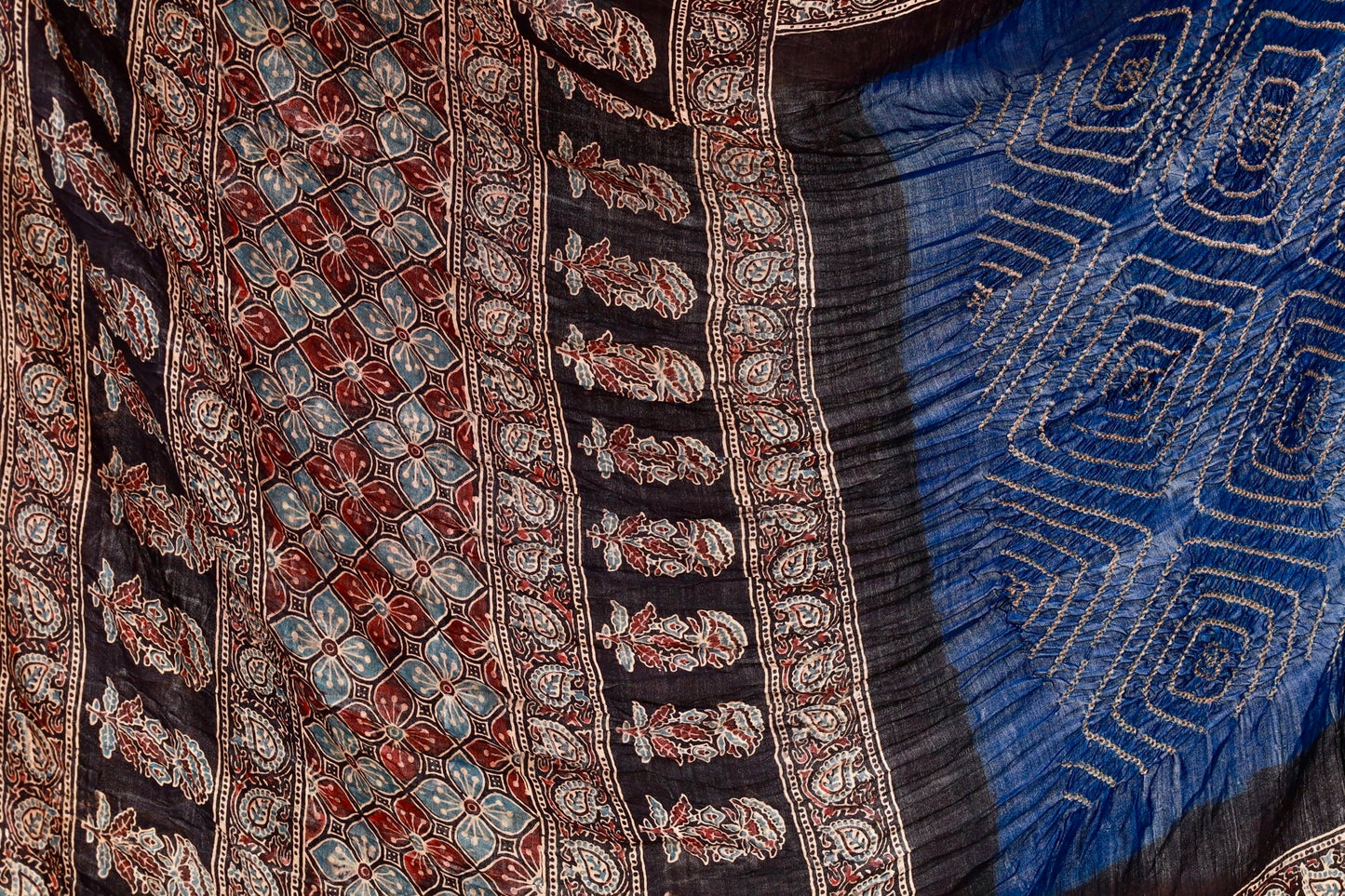 Handcrafted teal silk saree showcasing authentic Ajrakh and Bandhani artisan craftsmanship
