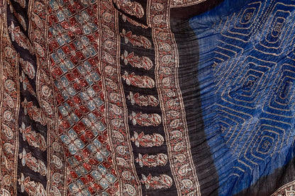 Handcrafted teal silk saree showcasing authentic Ajrakh and Bandhani artisan craftsmanship