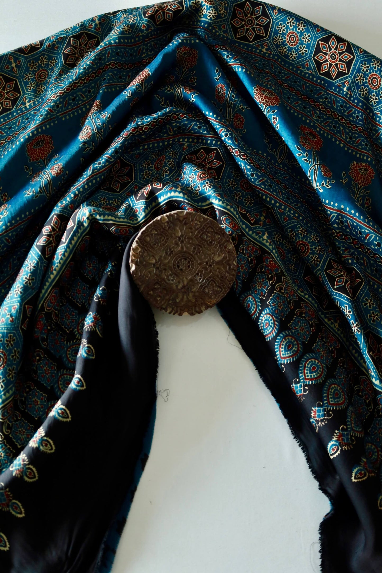 Elegant turquoise blue Ajrakh saree crafted in luxurious modal silk with heritage-inspired designs
