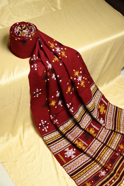 Traditional wine berry wool shawl showcasing authentic weaving artistry and timeless elegance
