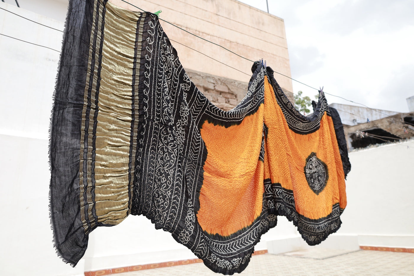 Ember Rai Bandhani silk saree featuring intricate tie-dye patterns and an elegant zari pallu
