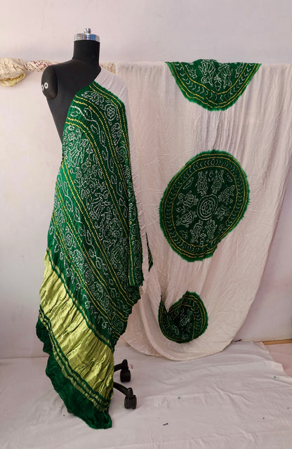 Emerald Bandhani Gajji silk saree featuring intricate tie-dye patterns and an elegant zari pallu