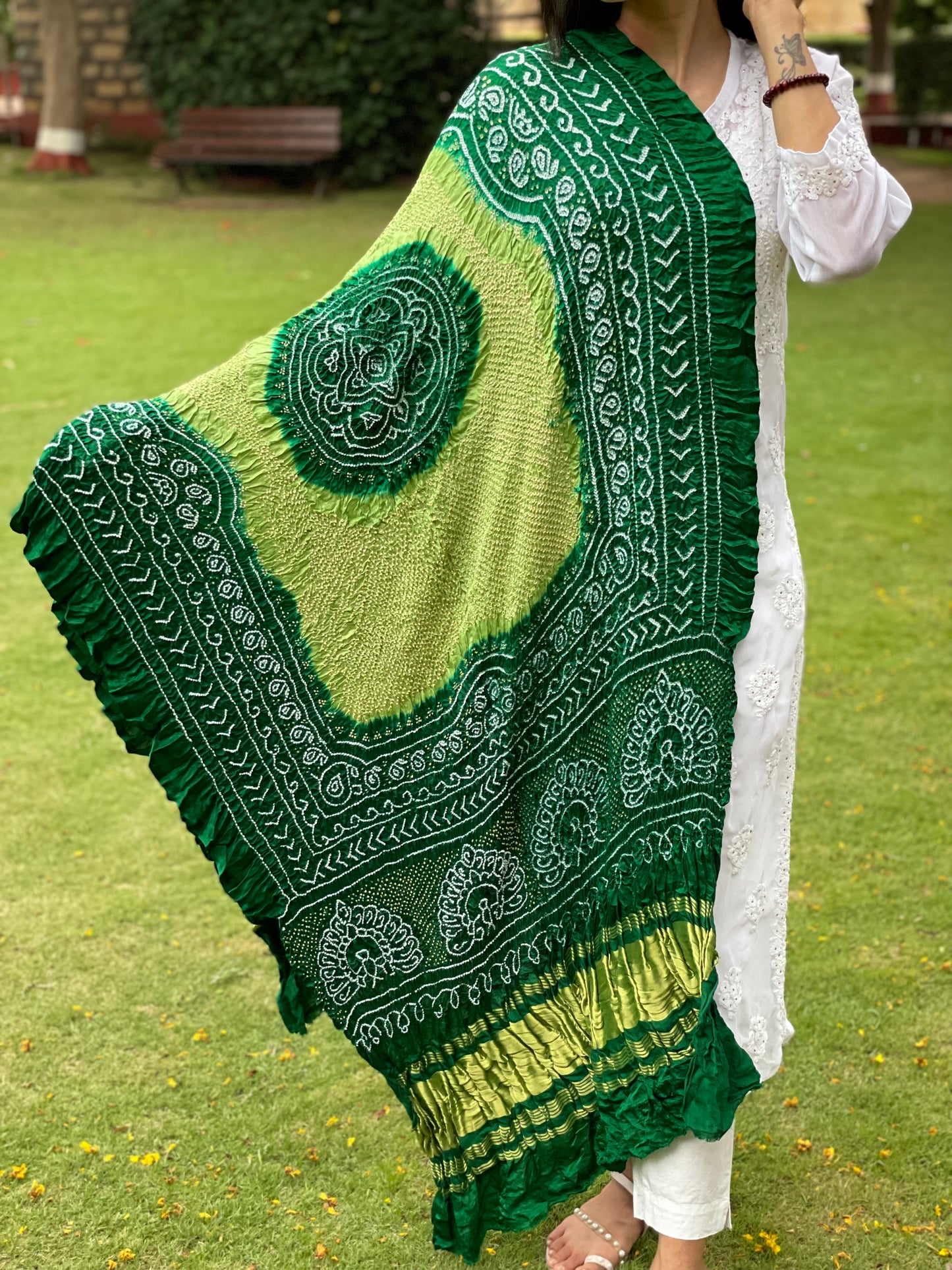 Luxurious emerald green Bandhani dupatta crafted in soft and lustrous Gajji silk