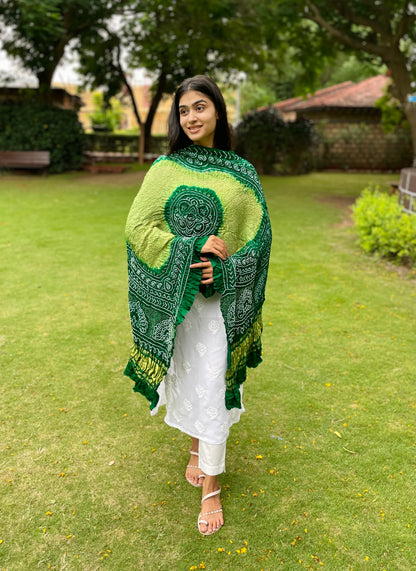 Traditional emerald green Bandhani Gajji silk dupatta with intricate artisanal patterns