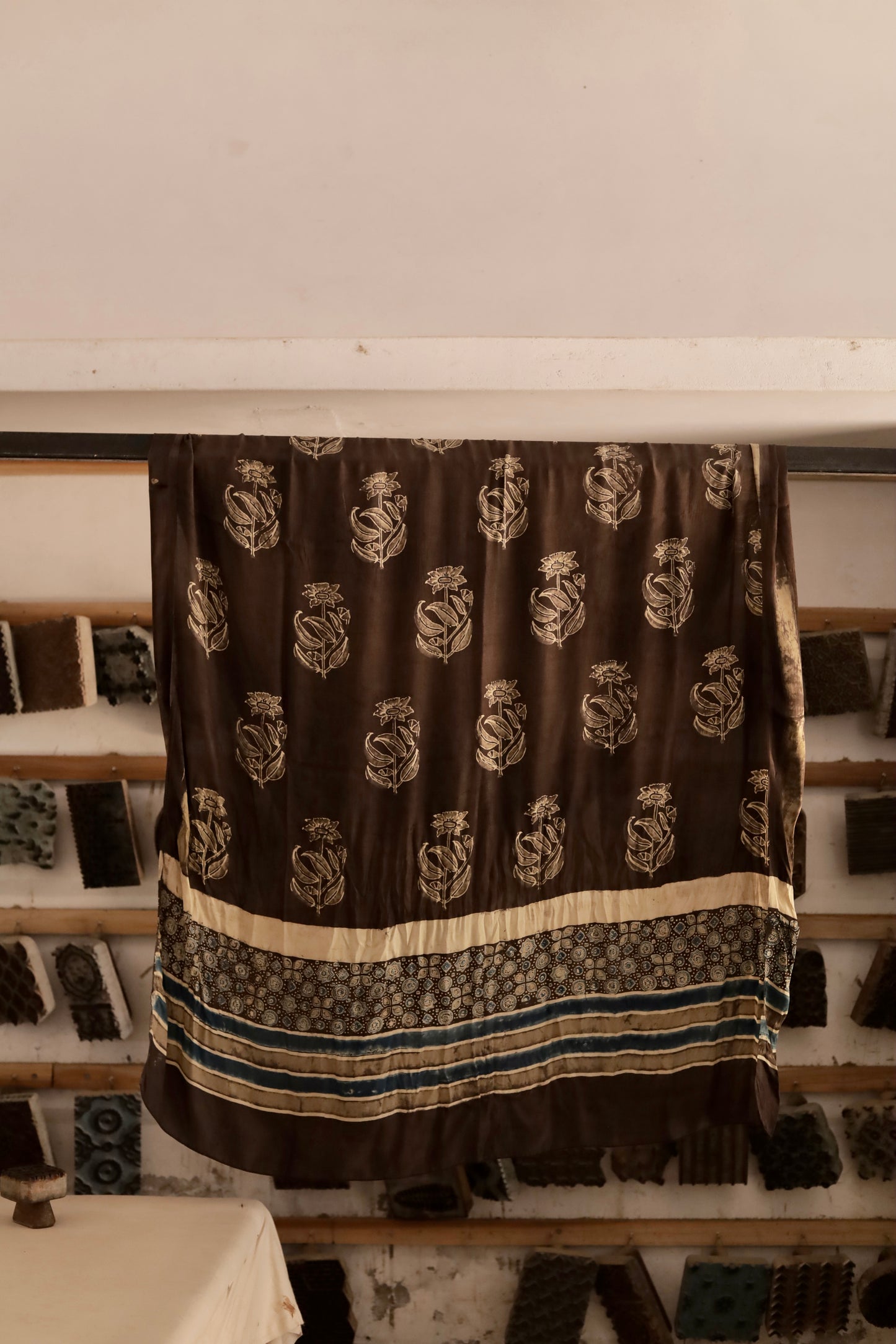 Espresso brown Ajrakh modal silk dupatta featuring intricate hand block printed motifs and elegant drape
