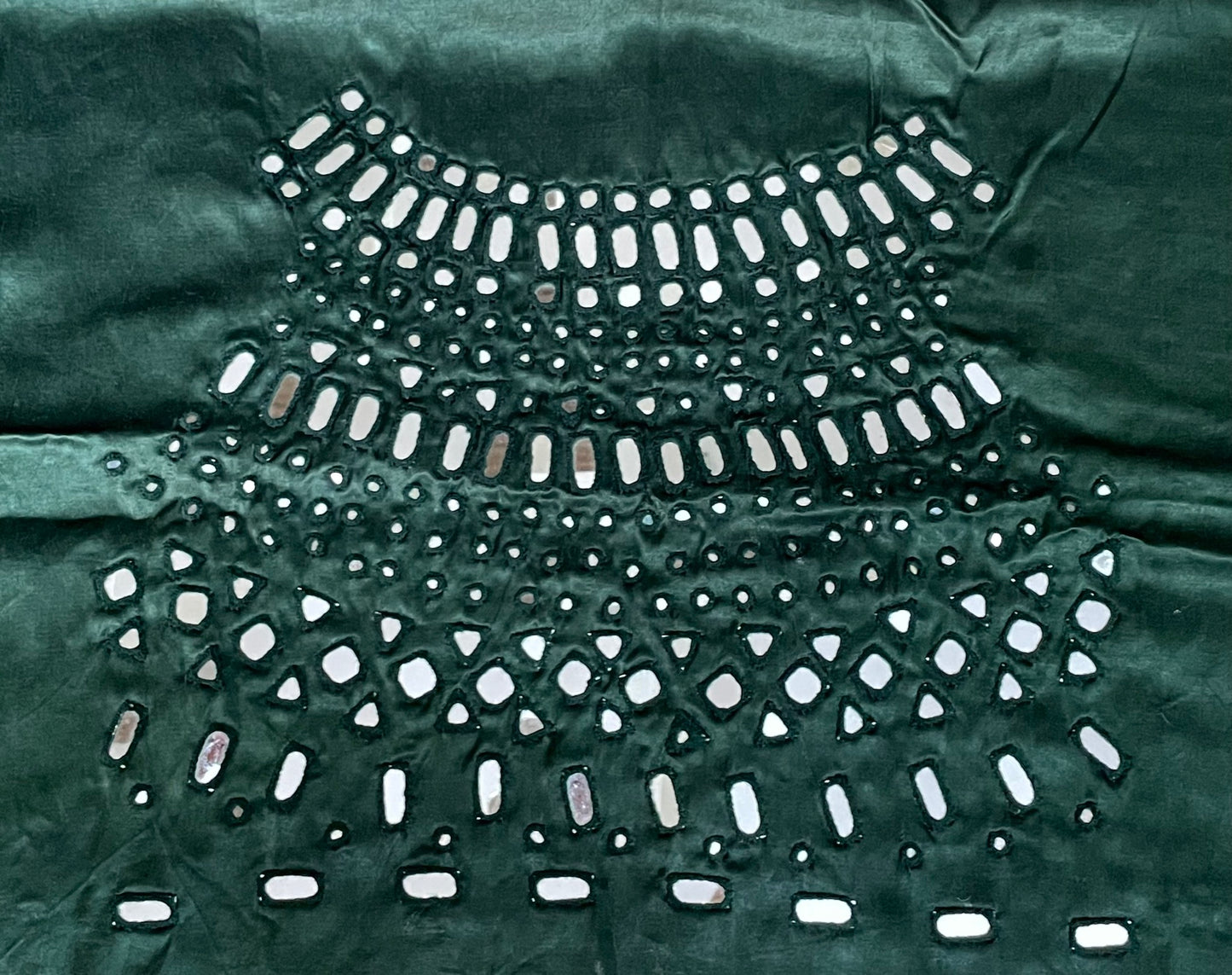 Forest green mirror work blouse piece showcasing intricate handcrafted embellishments