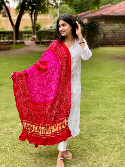 Ethnic fuchsia pink Gajji silk dupatta showcasing authentic Bandhani artistry