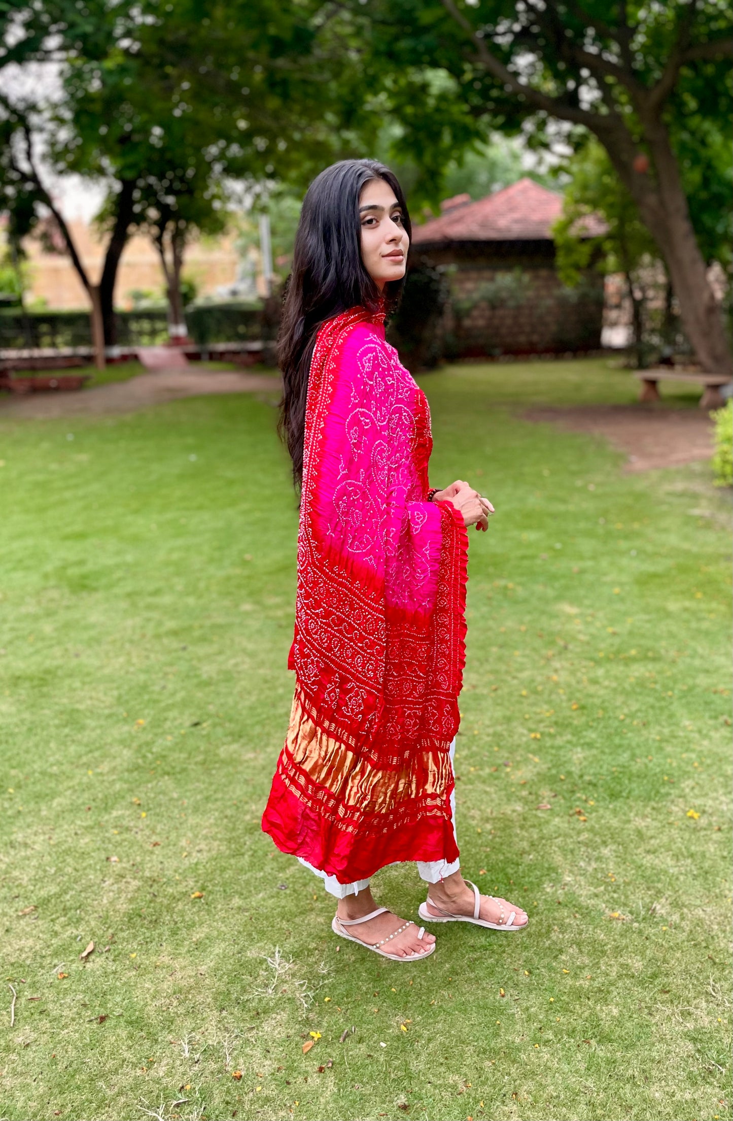 Traditional fuchsia pink Bandhani Gajji silk dupatta with intricate artisanal patterns