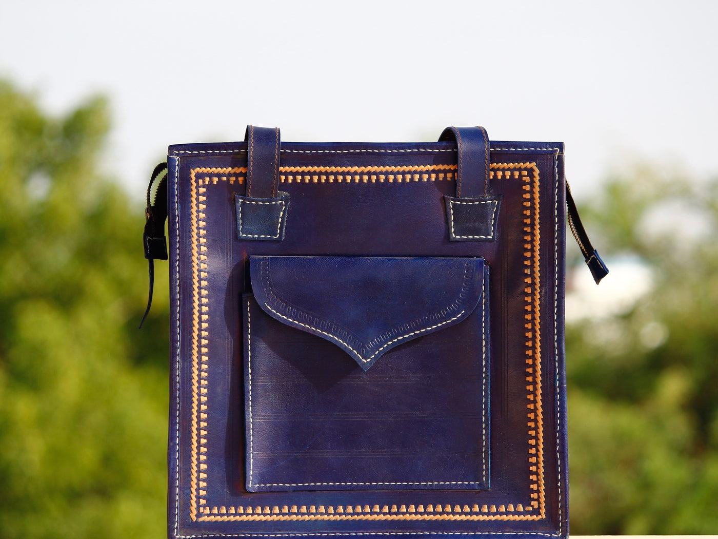 Handstitched leather bag crafted from premium leather with meticulous handmade detailing