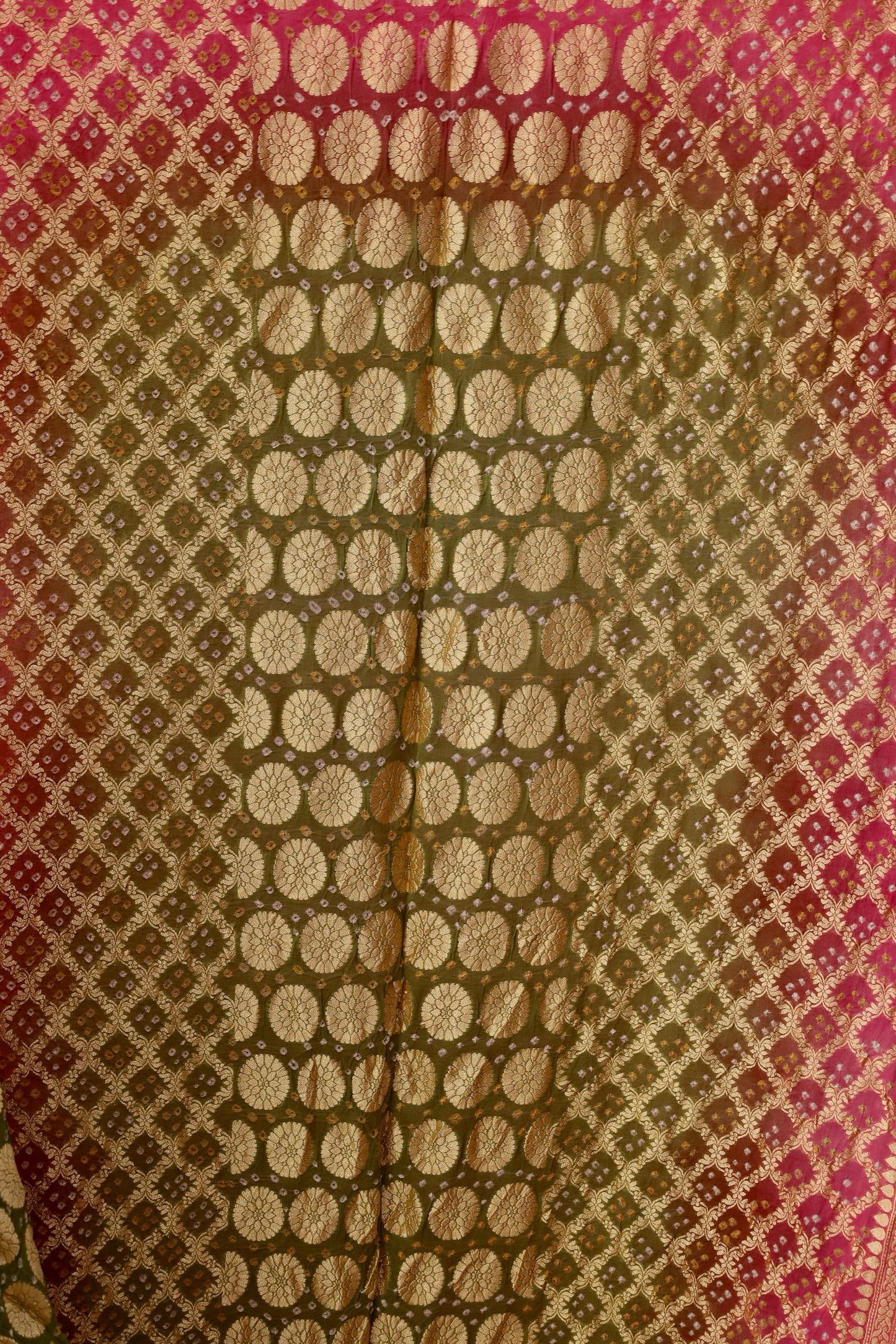 Traditional Bandhani Neem Zari saree showcasing fine handcrafted patterns and graceful drape
