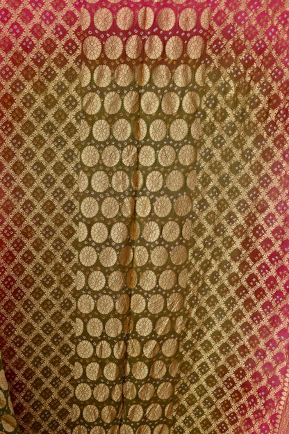Traditional Bandhani Neem Zari saree showcasing fine handcrafted patterns and graceful drape