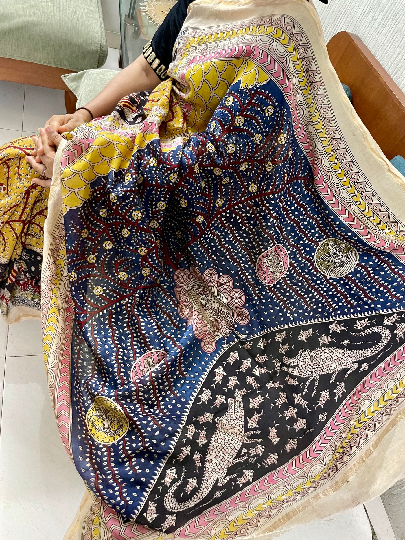 Traditional bloom Mata Ni Pachedi saree with vibrant handpainted motifs and graceful artisanal craftsmanship