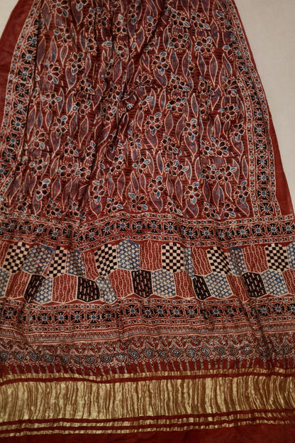 Handcrafted brick red Ajrakh dupatta made from premium modal silk with traditional Lagdi Patta detailing