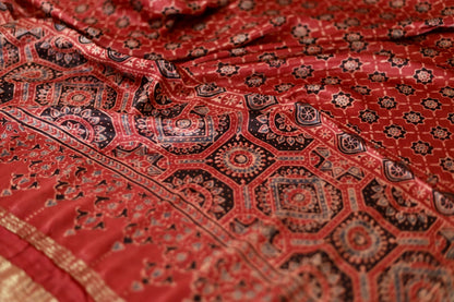 Handcrafted crimson red Ajrakh dupatta made from premium modal silk with traditional Lagdi Patta detailing