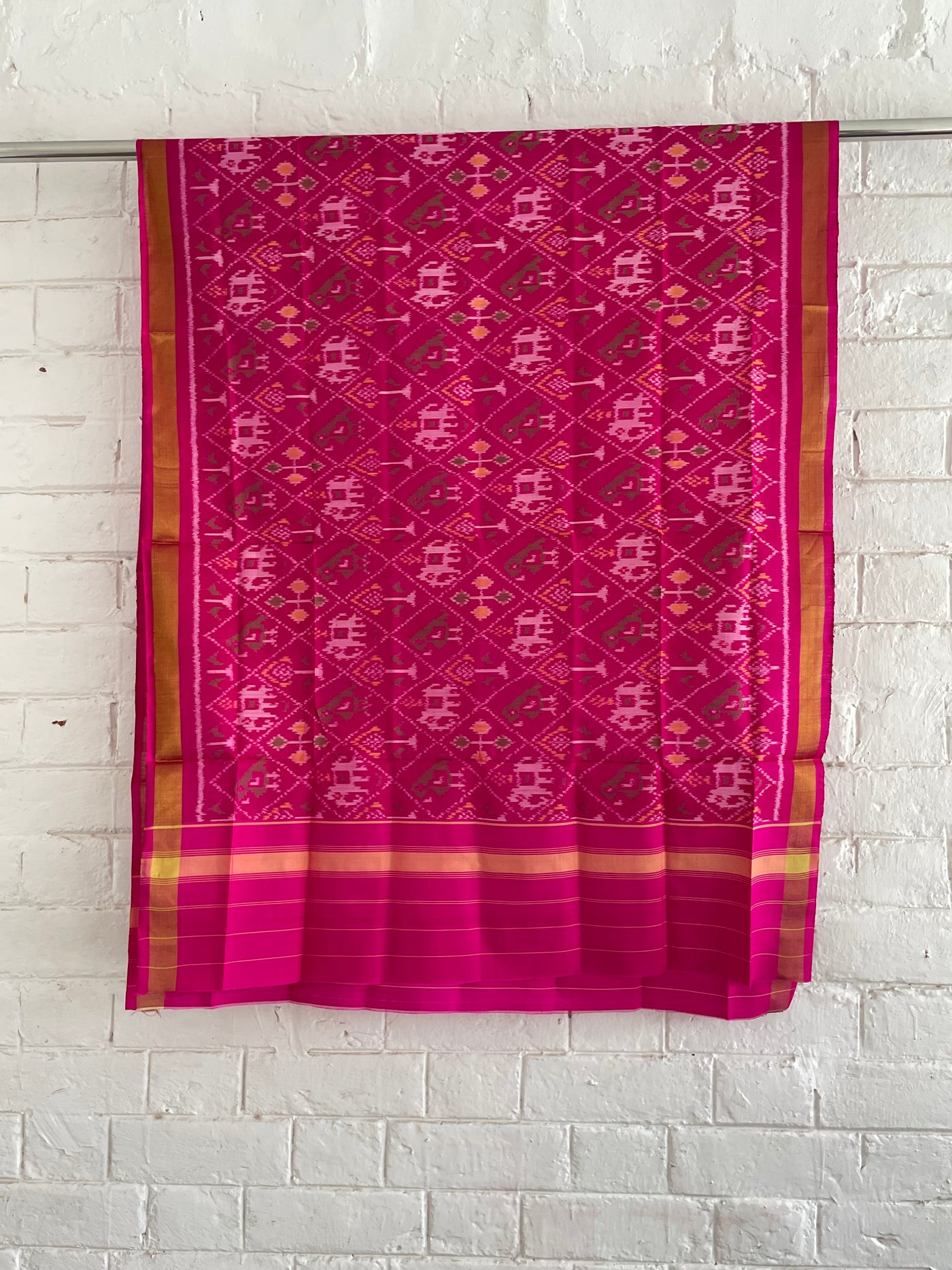 Handcrafted dark pink Patola dupatta showcasing authentic Single Ikkat weaving artistry