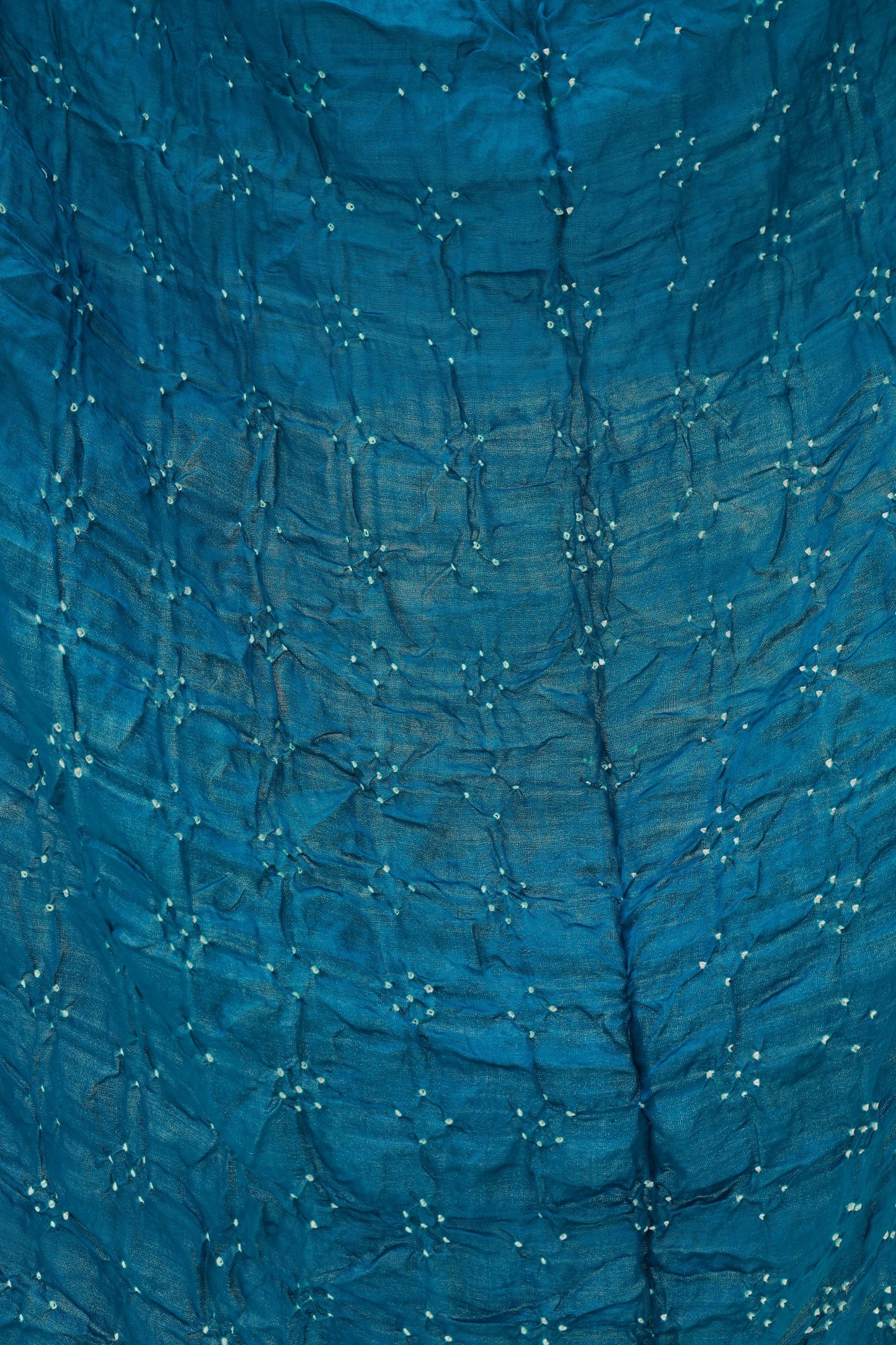 Elegant silk saree adorned with delicate Rai Bandhani motifs and a luxurious zari pallu