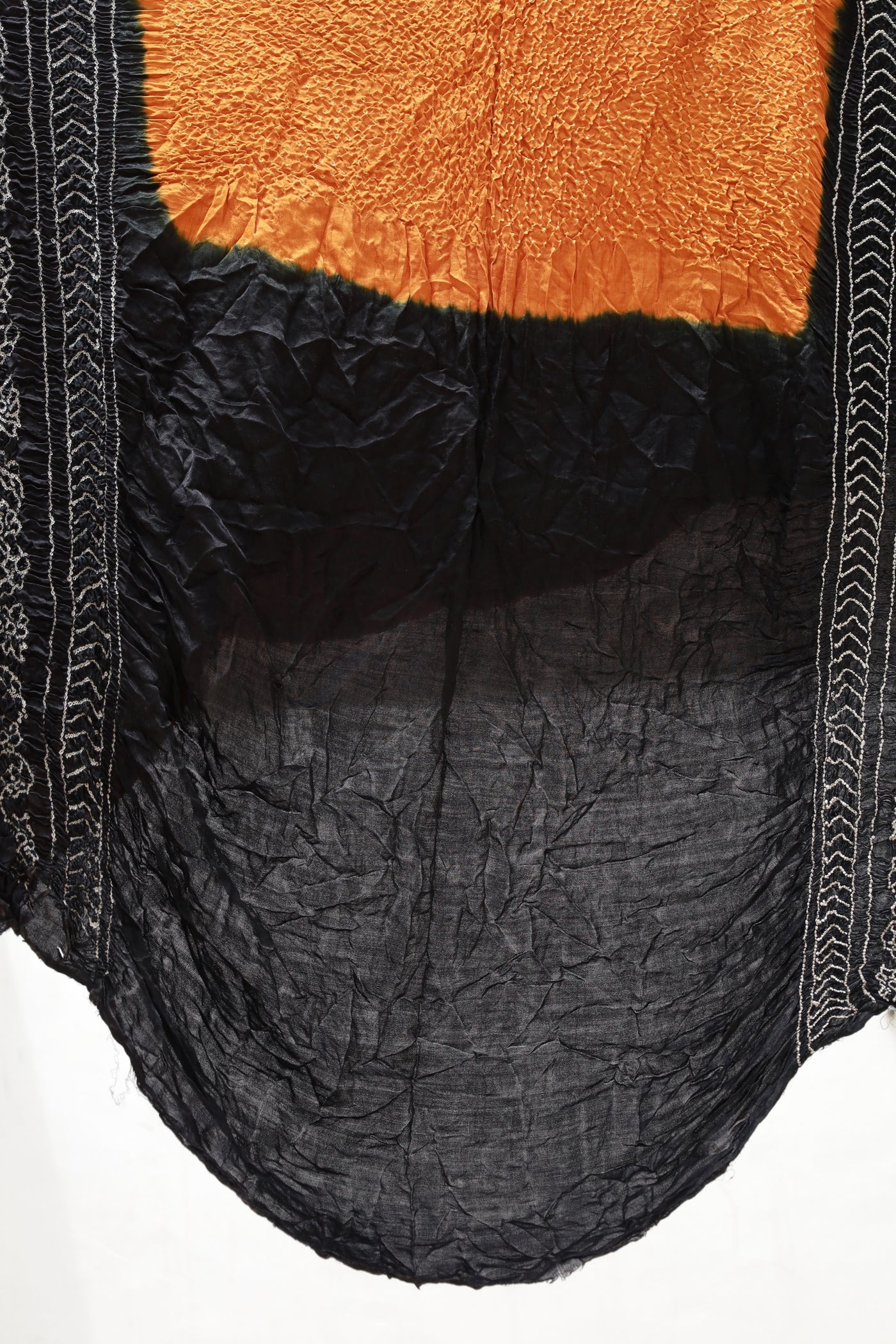 Elegant silk saree adorned with delicate Rai Bandhani motifs and a luxurious zari pallu