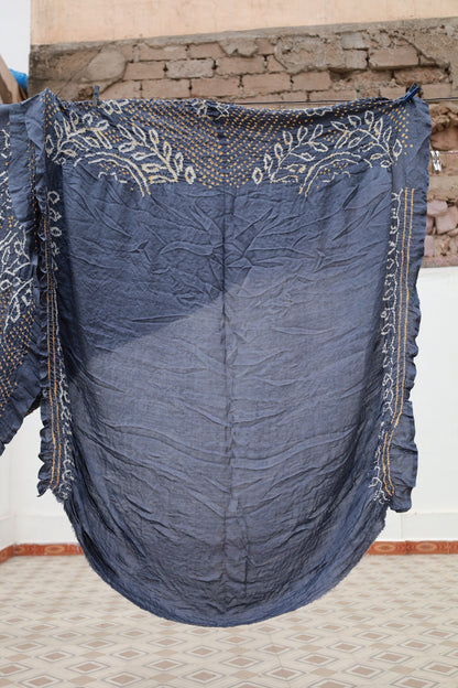 Premium indigo Rai Bandhani silk saree highlighting fine artisan craftsmanship and festive elegance