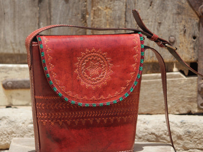 Handcrafted leather bag showcasing decorative thread work and heritage craftsmanship