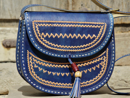 Handcrafted leather bag showcasing decorative thread work and durable craftsmanship