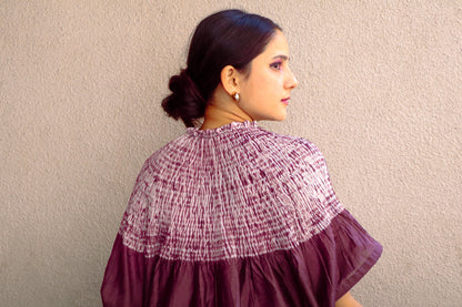 Traditional Bandhani Shibori silk kaftan highlighting rich craftsmanship and contemporary elegance