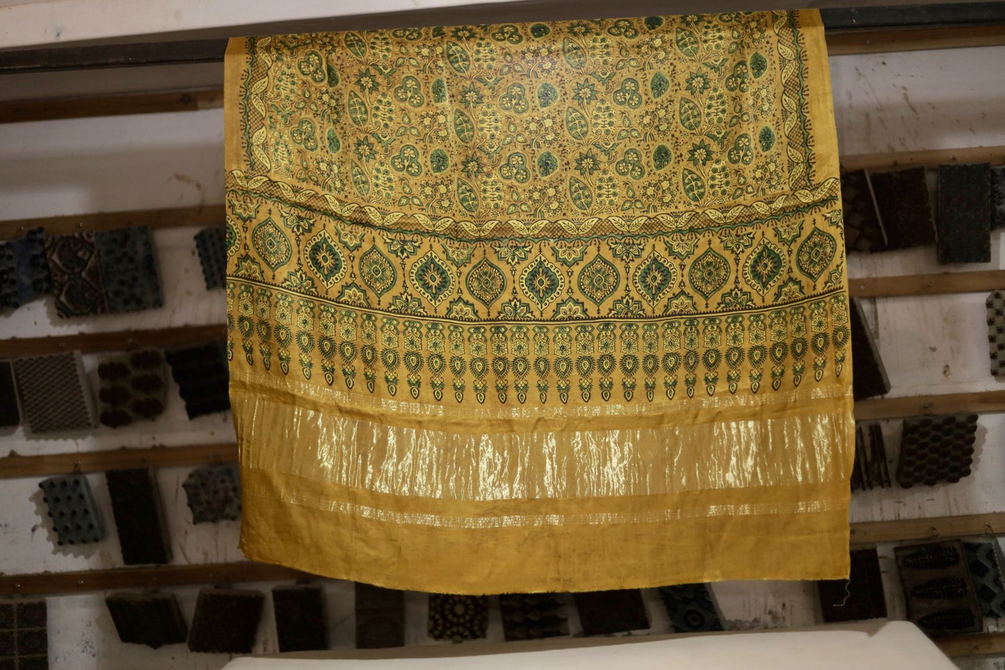 Handcrafted mustard gold Ajrakh dupatta made from premium modal silk with traditional Lagdi Patta detailing