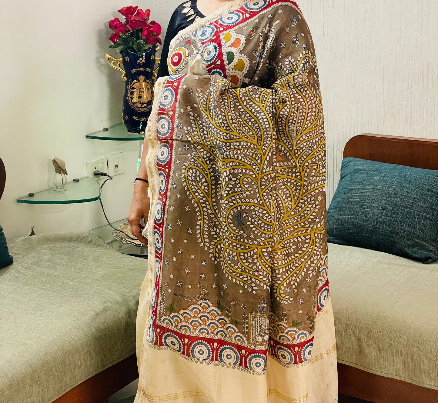 Traditional olive branch Mata Ni Pachedi saree with vibrant handpainted motifs and graceful artisanal craftsmanship