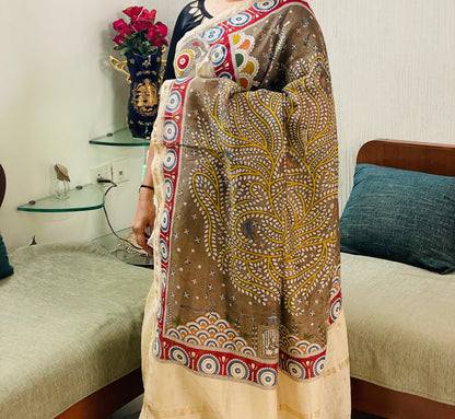 Traditional olive branch Mata Ni Pachedi saree with vibrant handpainted motifs and graceful artisanal craftsmanship