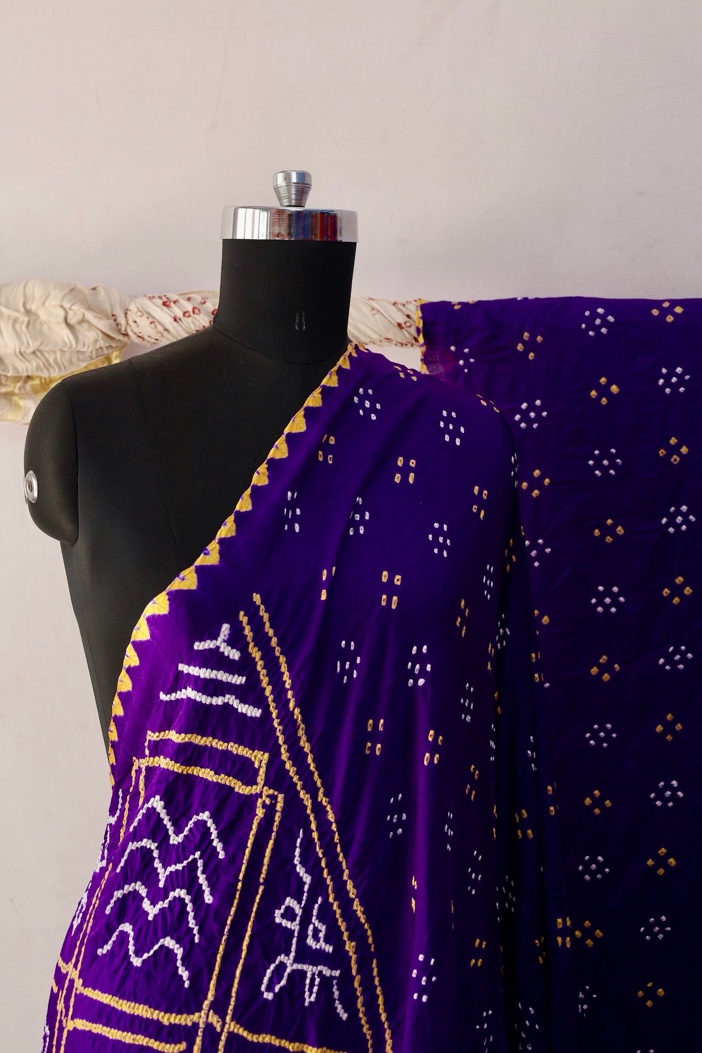 Handcrafted orchid Gajji silk saree showcasing authentic Bandhani artistry with rich zari detailing