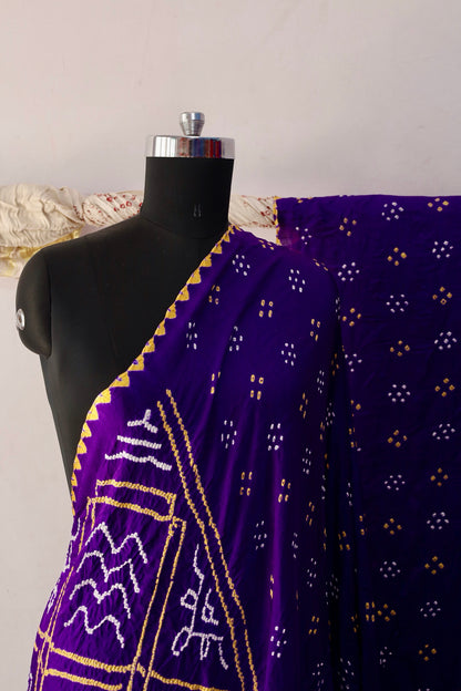 Handcrafted orchid Gajji silk saree showcasing authentic Bandhani artistry with rich zari detailing