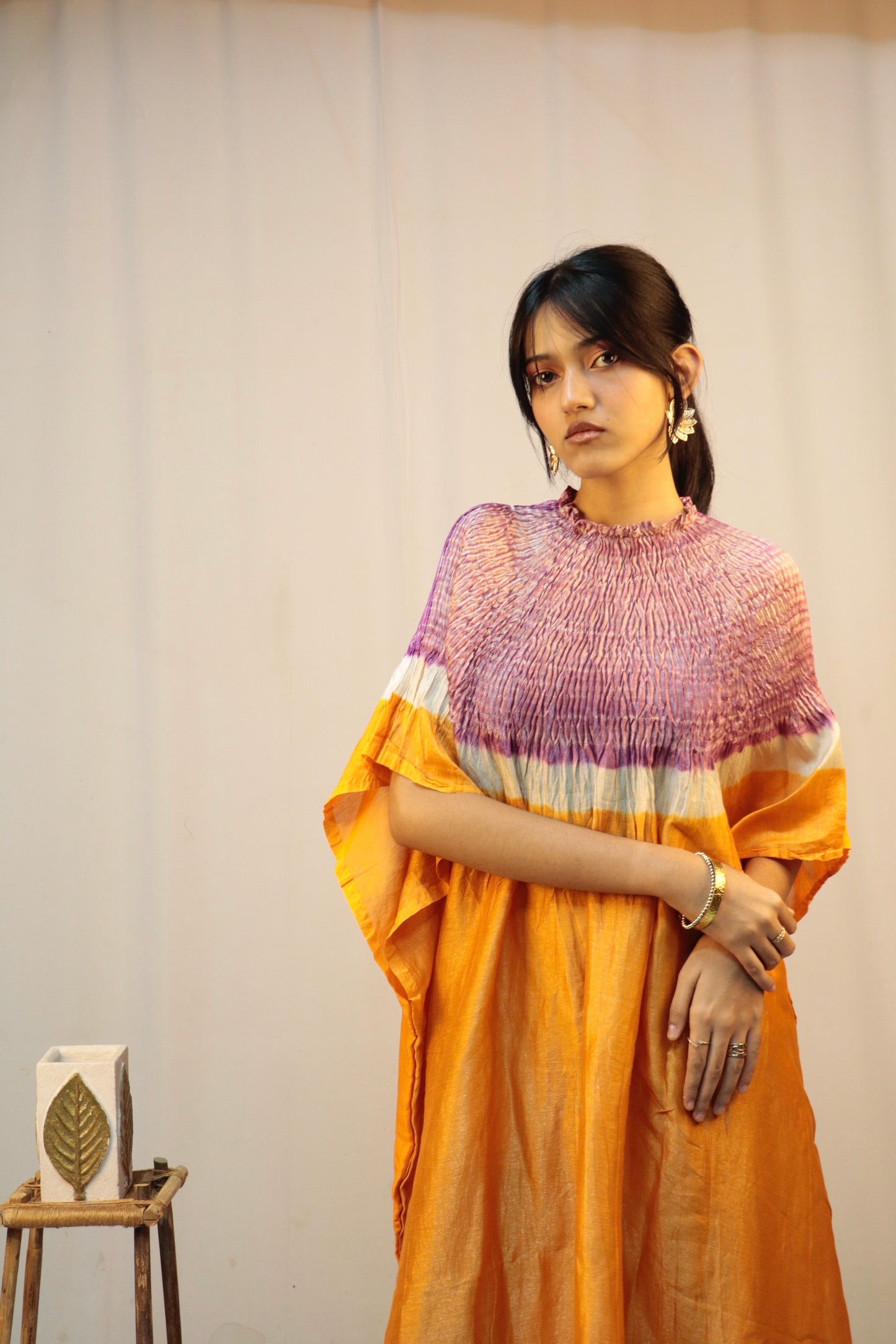 Premium silk kaftan in saffron fade tones adorned with detailed Bandhani Shibori patterns