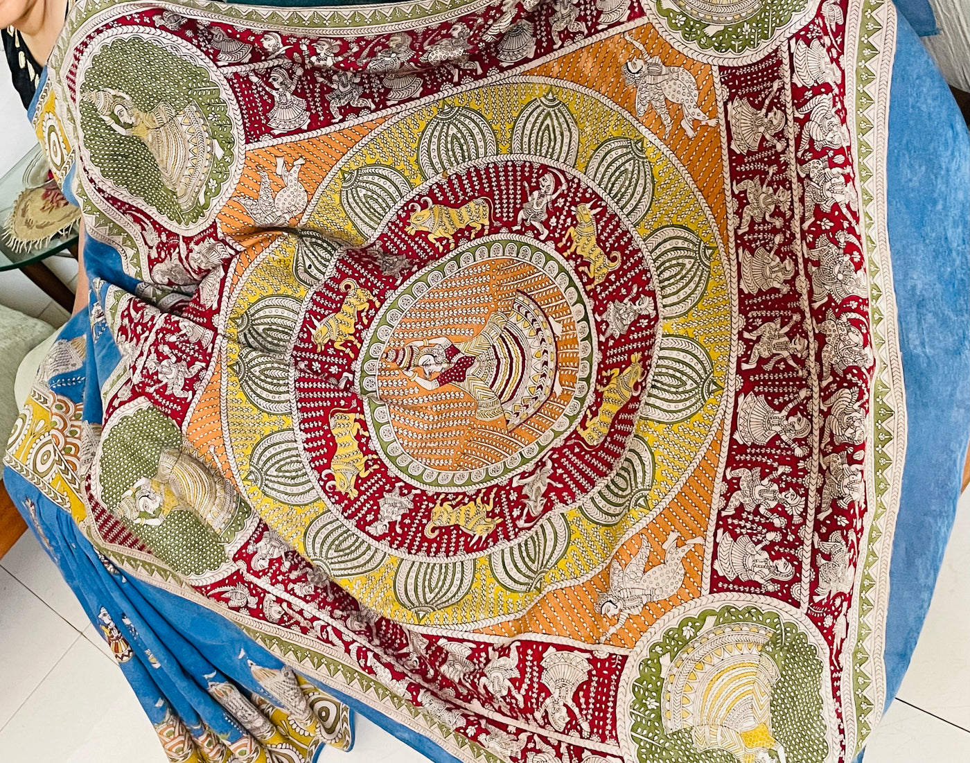 Premium sky gold handpainted saree reflecting the cultural richness and storytelling tradition of Mata Ni Pachedi art
