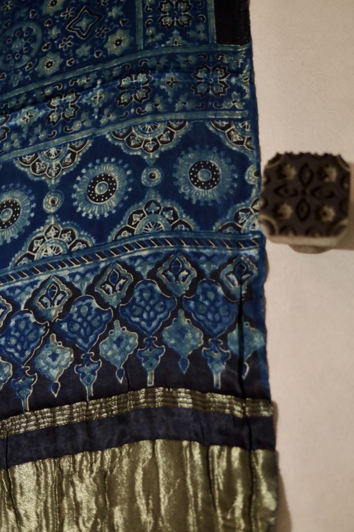 Handcrafted steel blue Ajrakh dupatta made from premium modal silk with traditional Lagdi Patta detailing