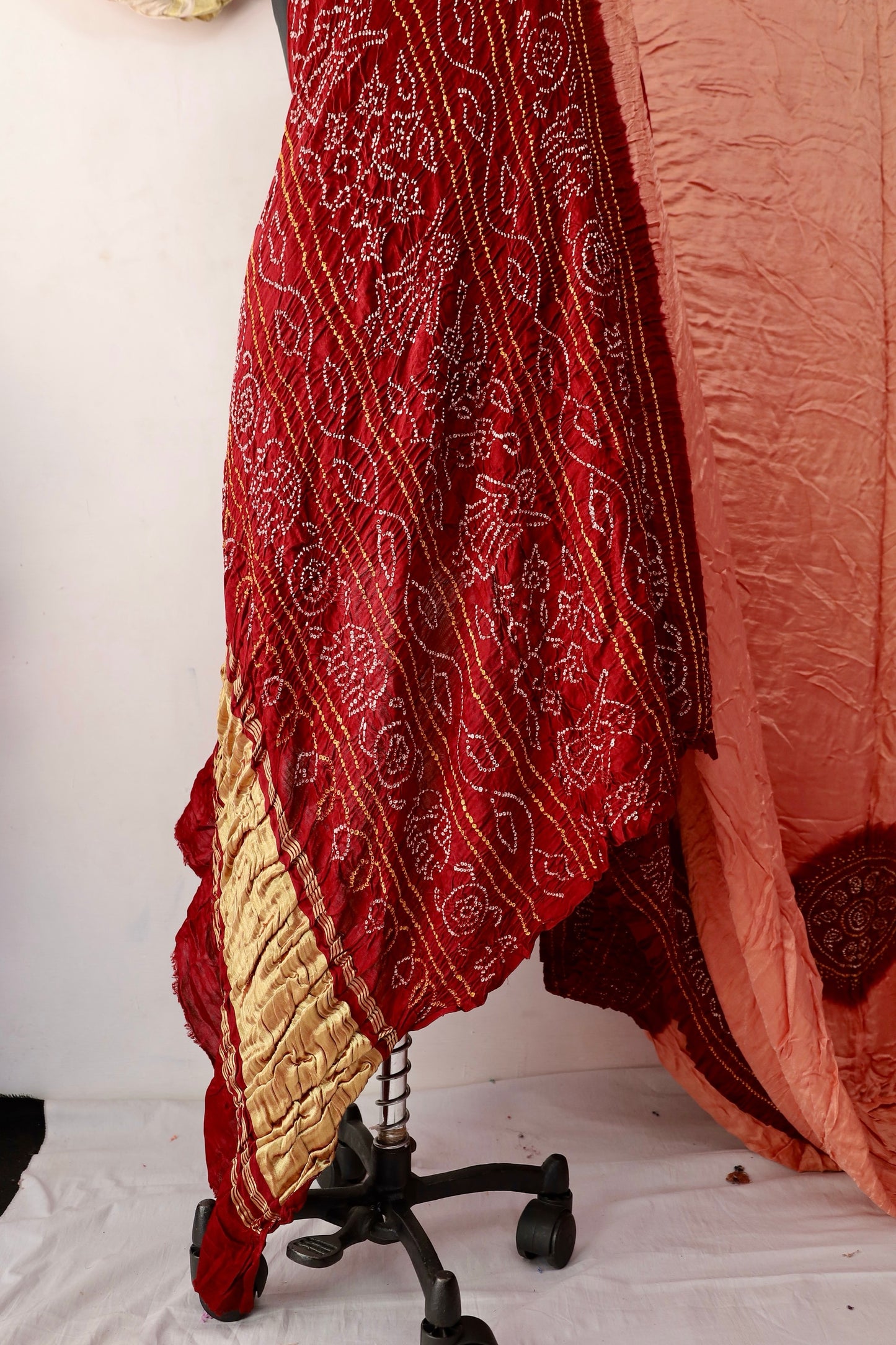 Elegant Gajji silk saree adorned with delicate Bandhani motifs and a luxurious zari pallu